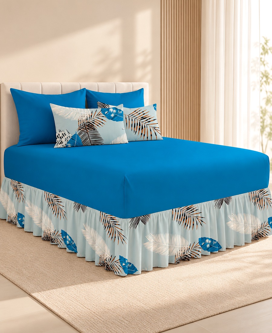 Blue and white floral bedding set in a bright bedroom